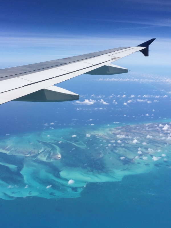 A view of Bahamas' turquoise waters from an airplane. 